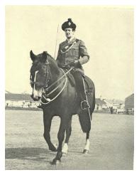 Lieutenant Colonel G D Archer R IRISH commands the parade on horseback